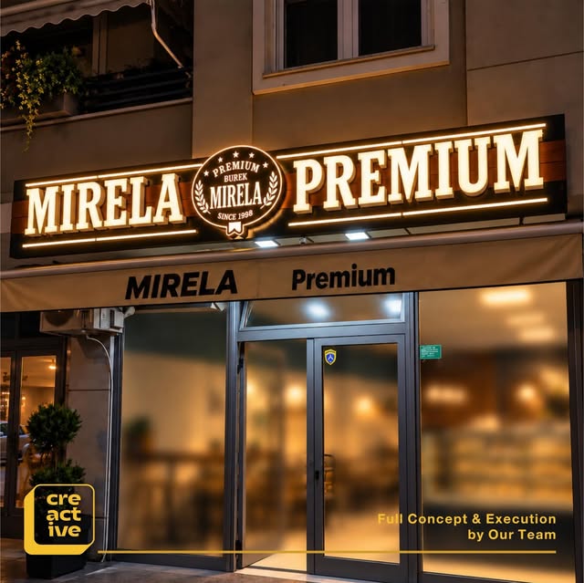 Facade with illuminated lettering for Mirela Premium