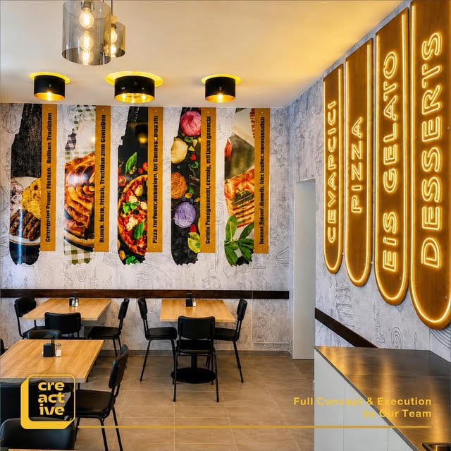 Wall graphics with pizza motifs for a restaurant
