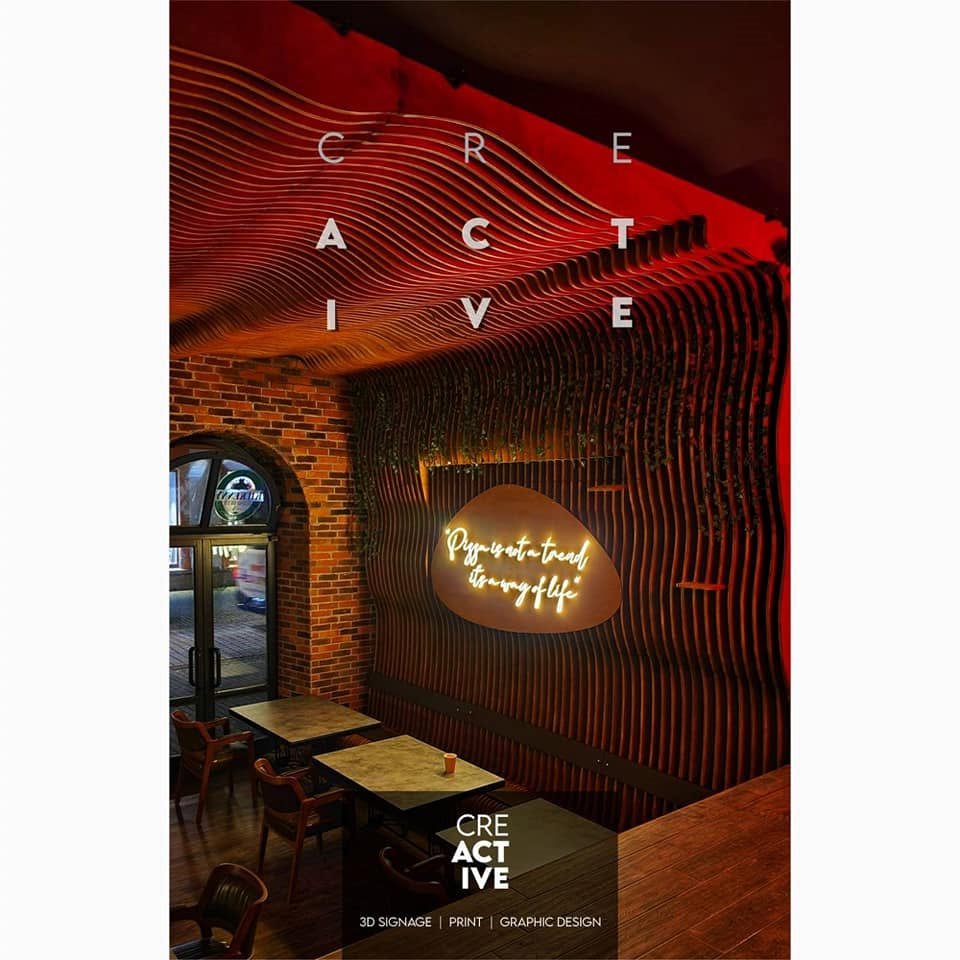 Rossini – Parametric wall with “Pizza is not a trend” neon